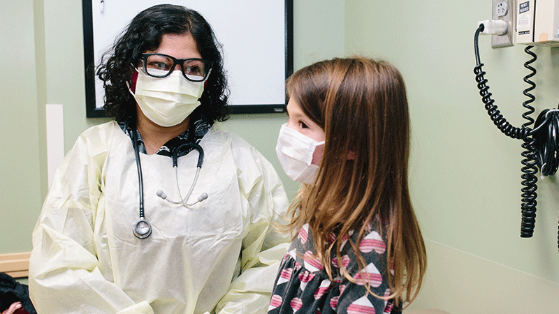 Dr. Meghana Sathe with a patient at Children's Health
