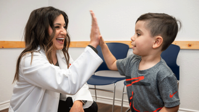 Danielle Emmette with patient at Children's Health Desoto