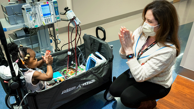 Dr. Griffiths with patient Jahelle in the Heart Center at Children's Health.